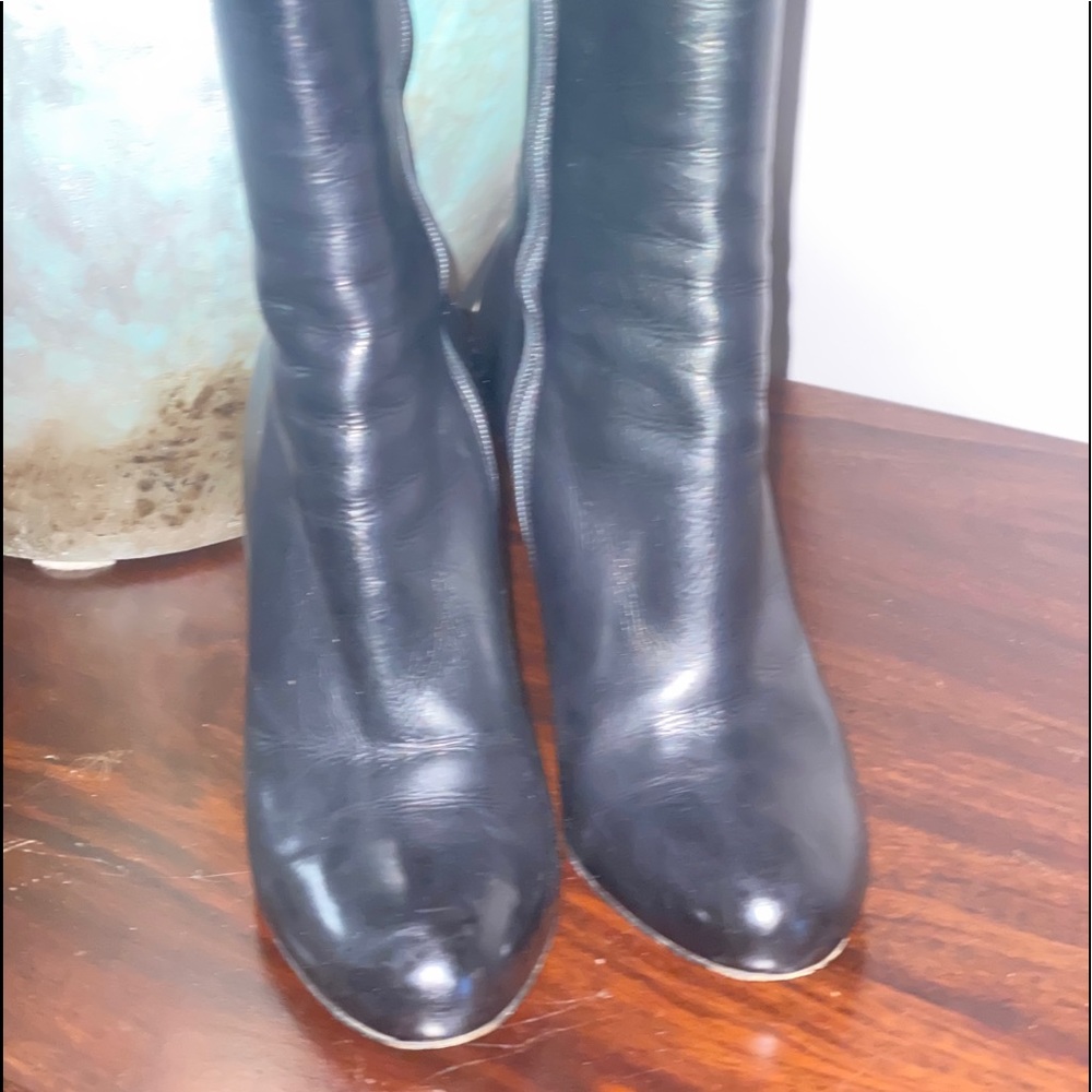 Black heeled boots w/dust bag. High knee heeled boots. Great condition